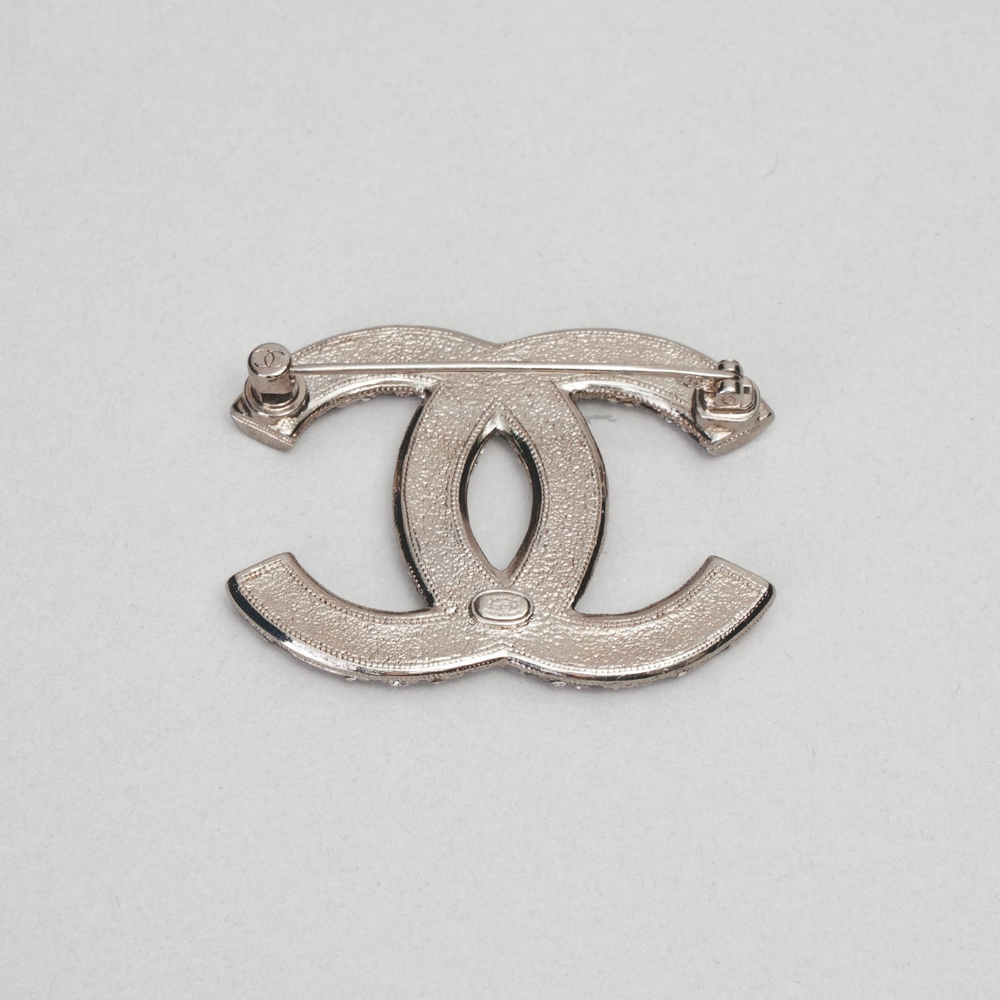 Broche étoile strass CHANEL argenté