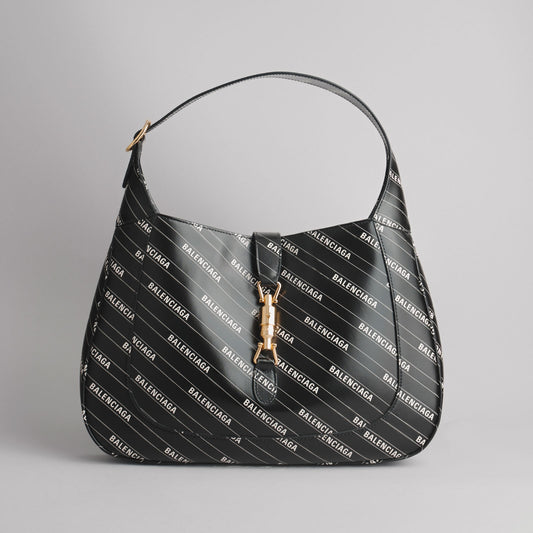 BALENCIAGA — Sac Jackie XL en cuir imprimé logo