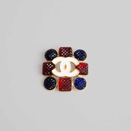 Broche en or CHANEL rouge / marine / blanc Métier d art Manchester