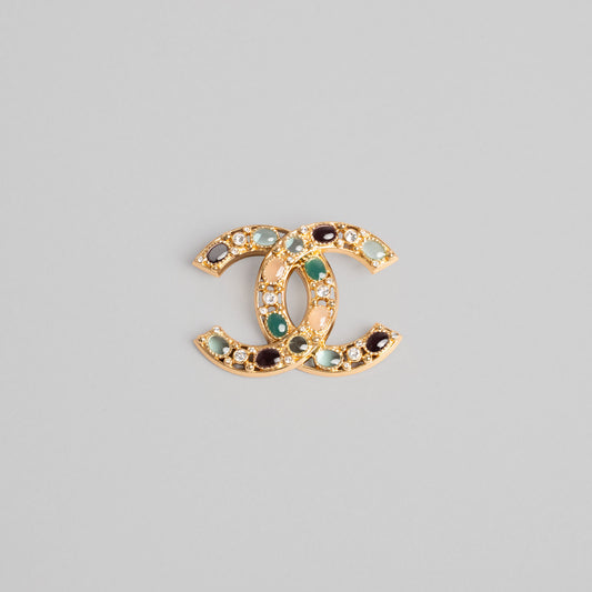 Broche CHANEL vert cabochon doré paris Manchester