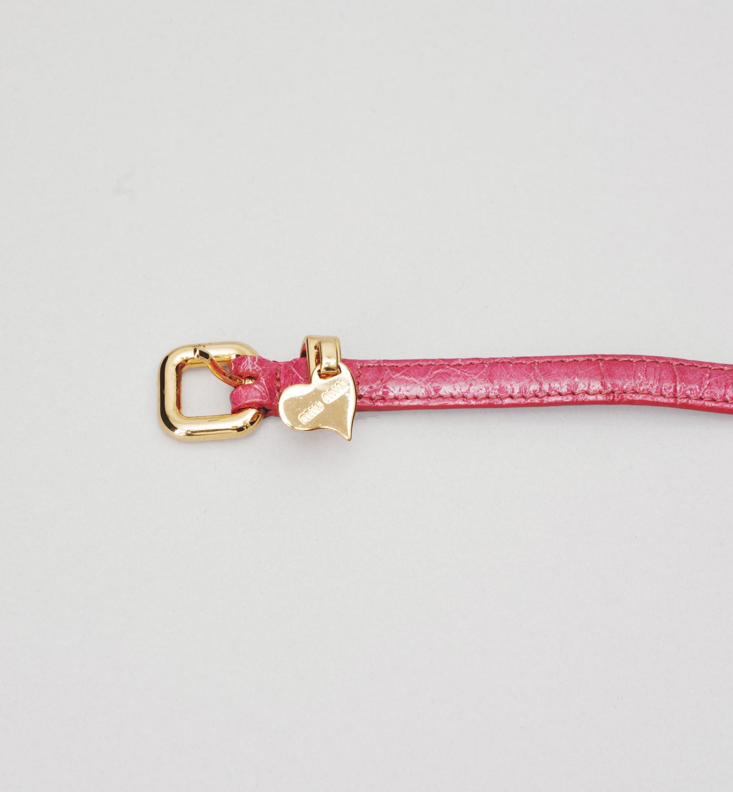 Bracelet Miu Miu en Cuir Rose & Charme Cœur Doré